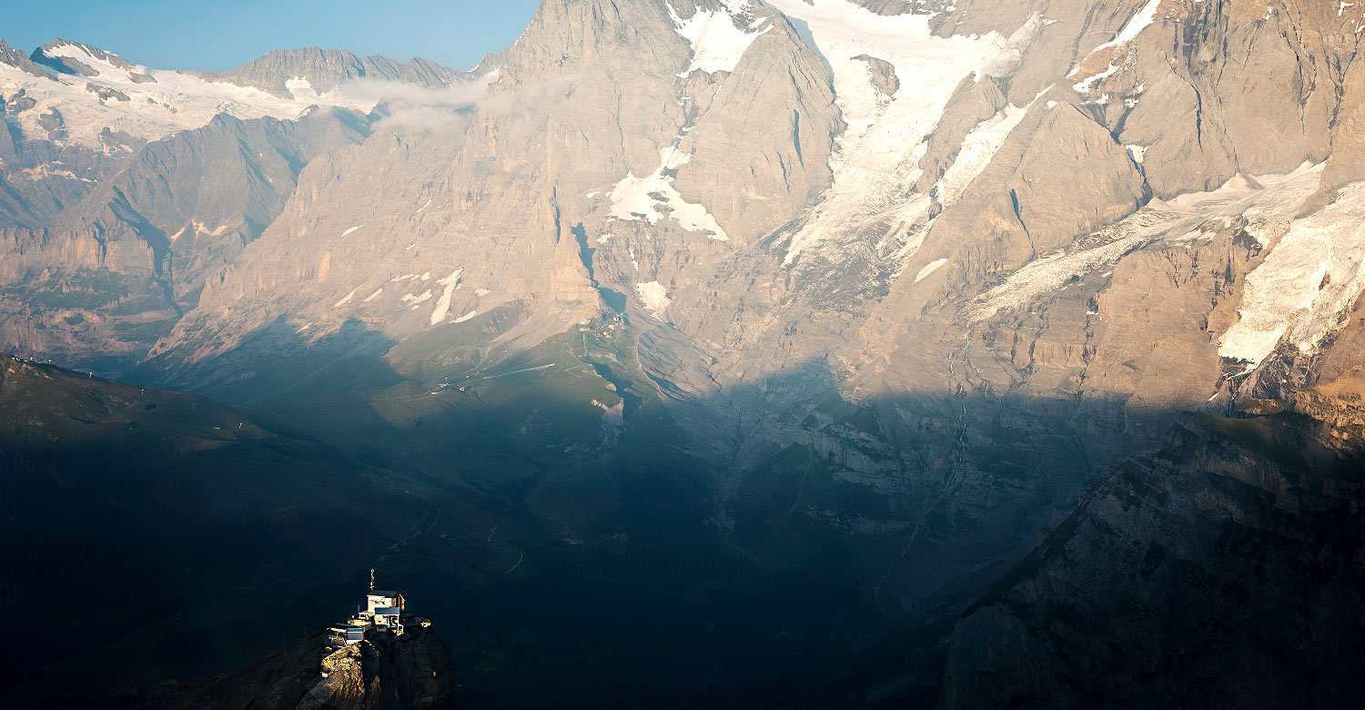 View from the Schilthorn mountain with the Birg mountain station in the strip light.
