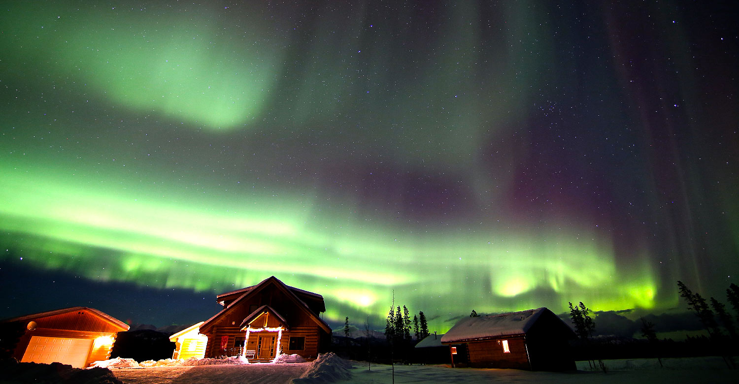 View the spectacular Northern Lights in Yukon's winter wonderland.