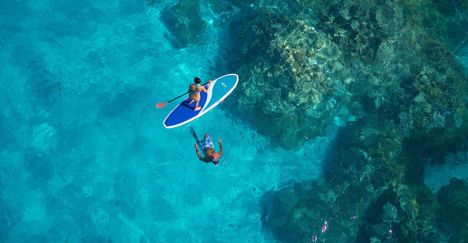 Enjoy water sport activities such as paddling at InterContinental Bora Bora Le Moana Resort
