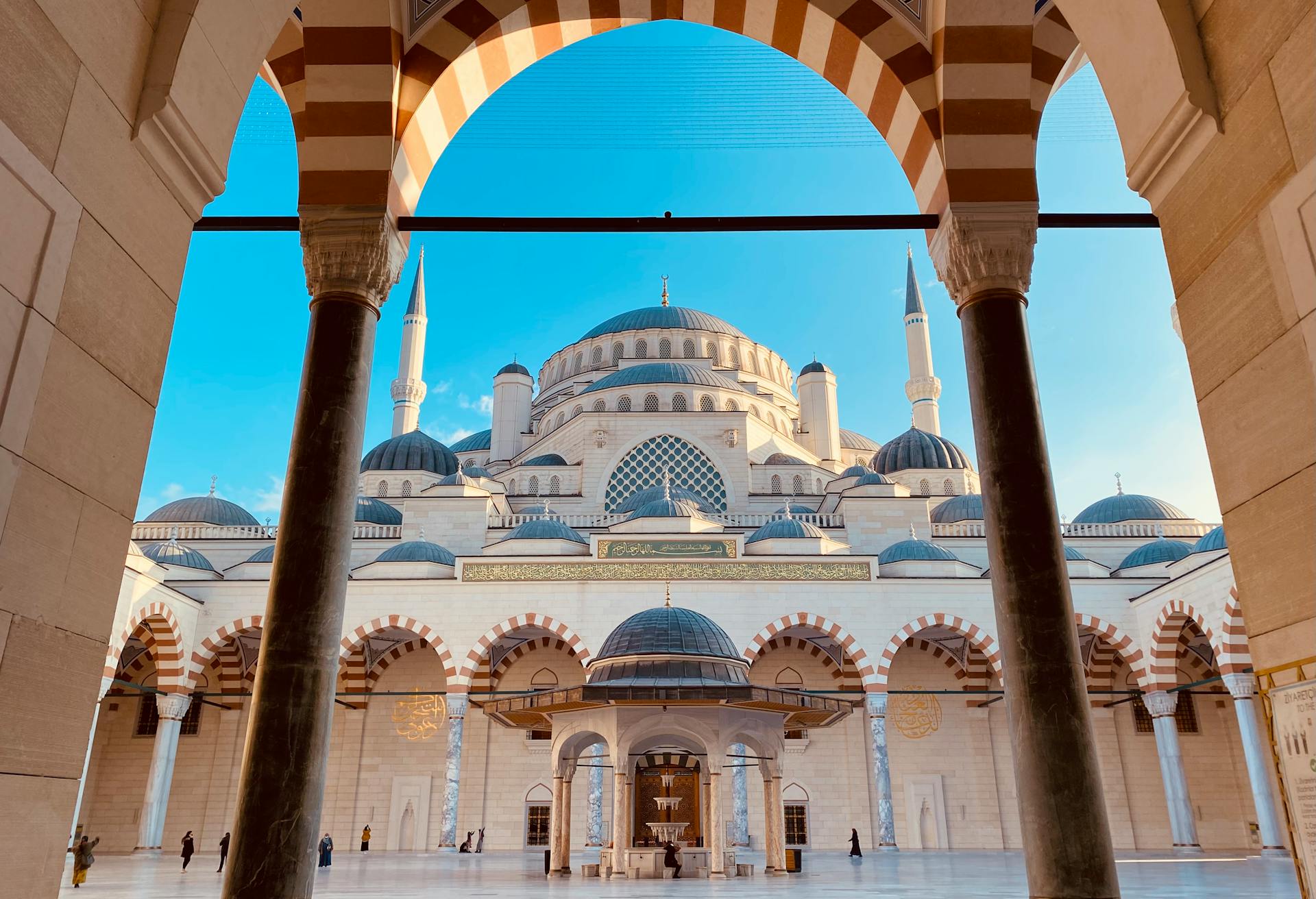 A low-angle view of the majestic Hagia Sophia, one of the most historically significant religious structures in the world.