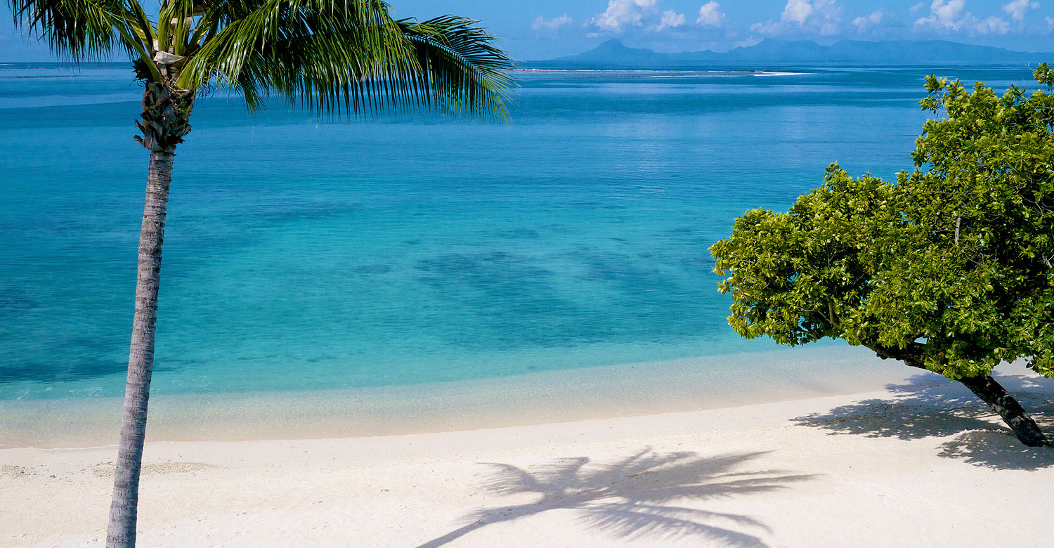 Relax on the beautiful beach at Maitai Lapita Village