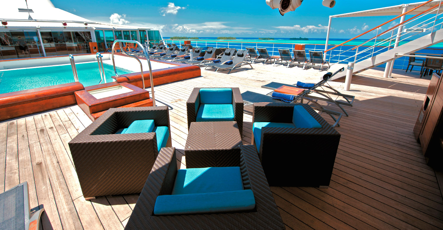Stylish bar and pool of M/S Paul Gauguin.