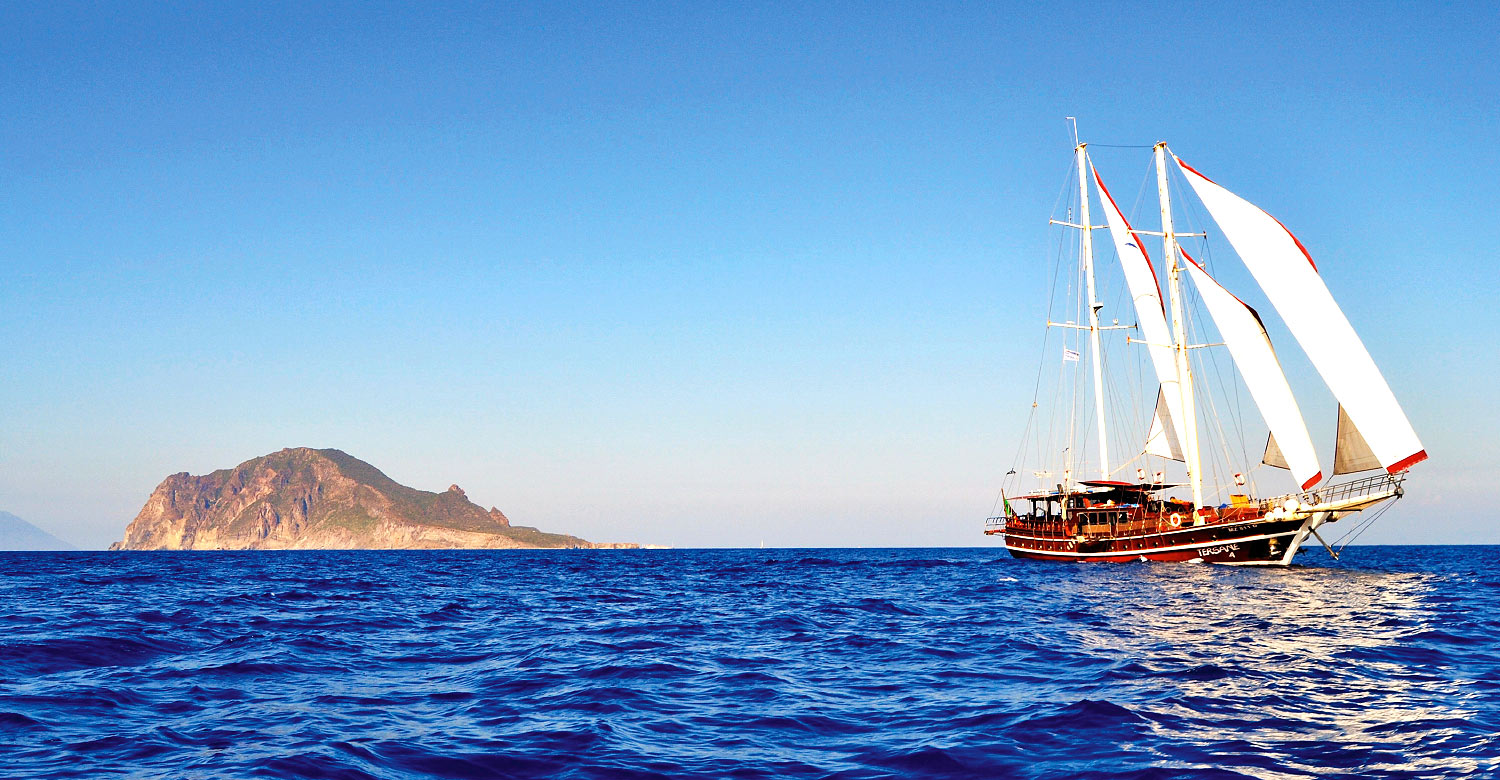 Discover Sicily with an Aeolian Islands cruise aboard a traditional gulet.