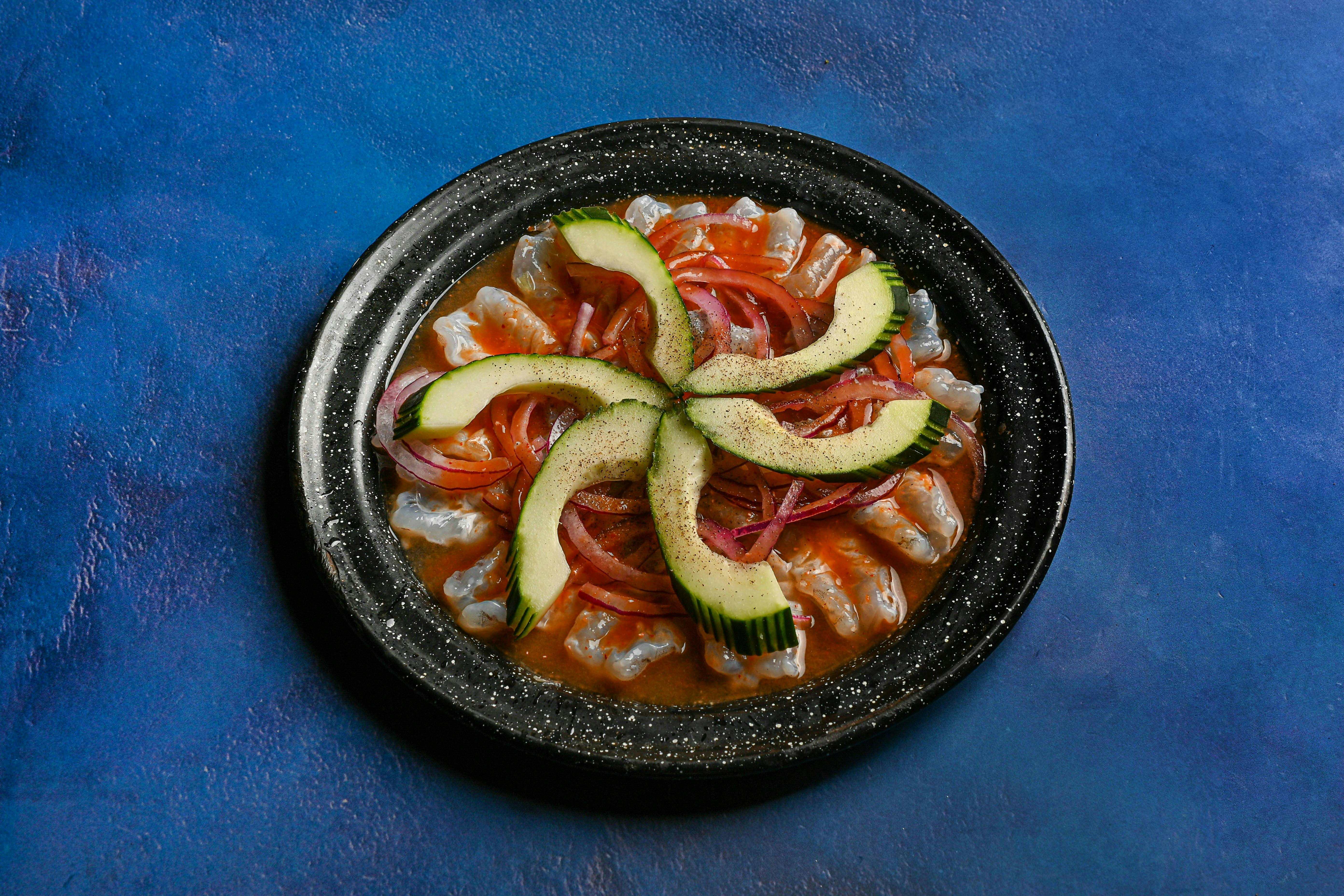 A plate of fresh fish and vegetables