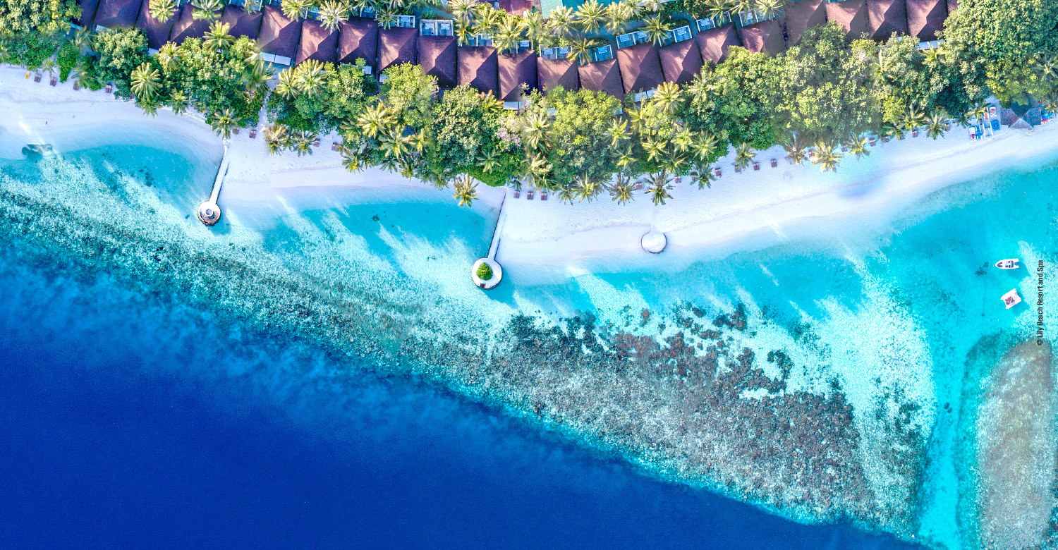 Panoramic aerial shot of Lily Beach Resort and Spa.