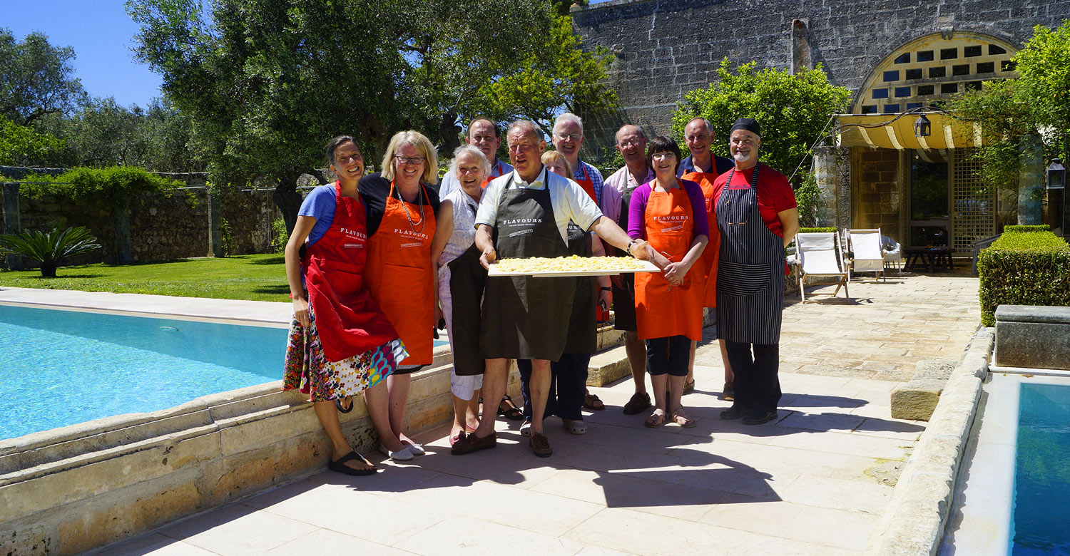 A group of people enjoying a week-long cooking class in Puglia