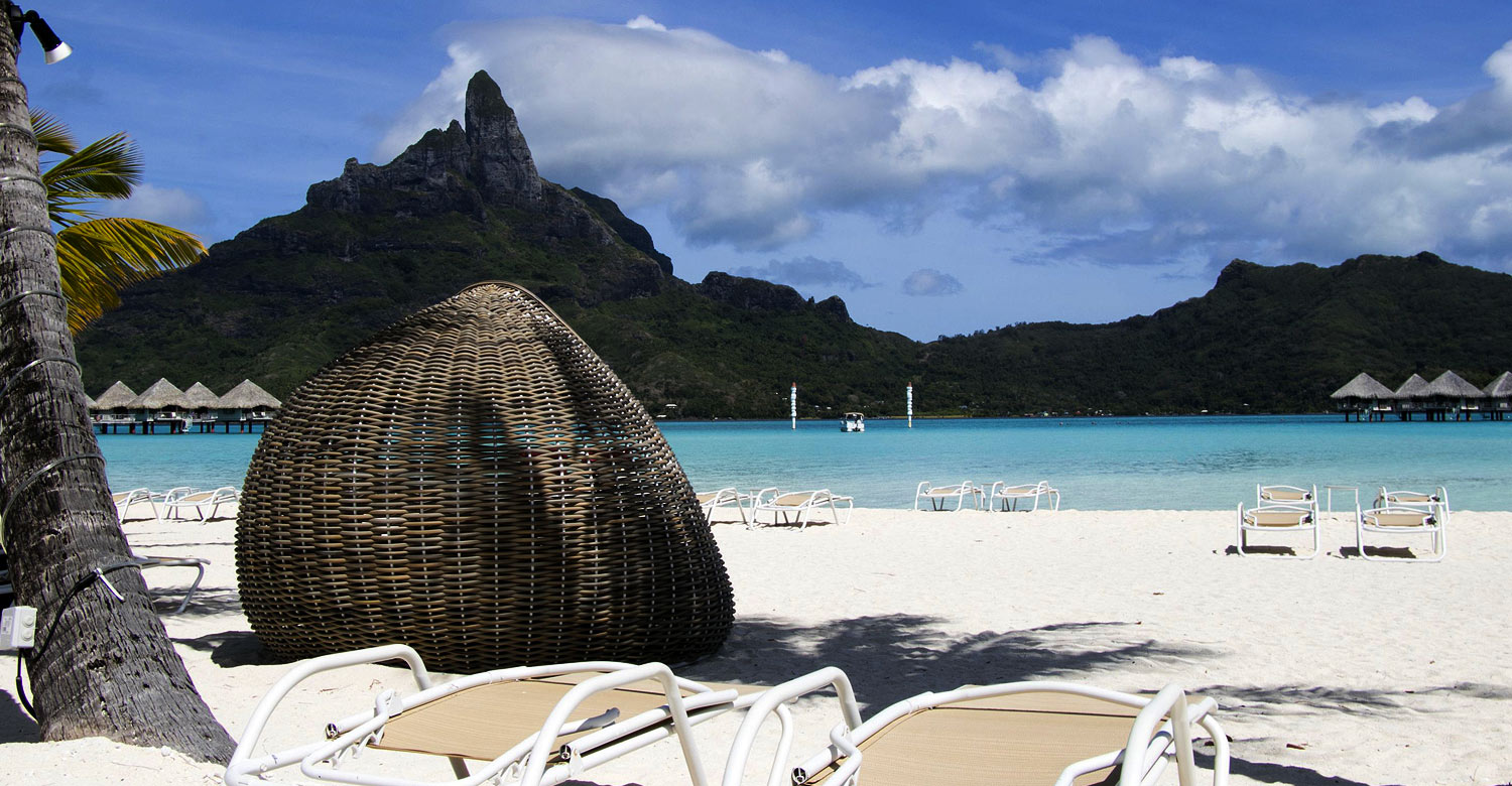 Relax on the powdery beaches at Le Meridien Bora Bora