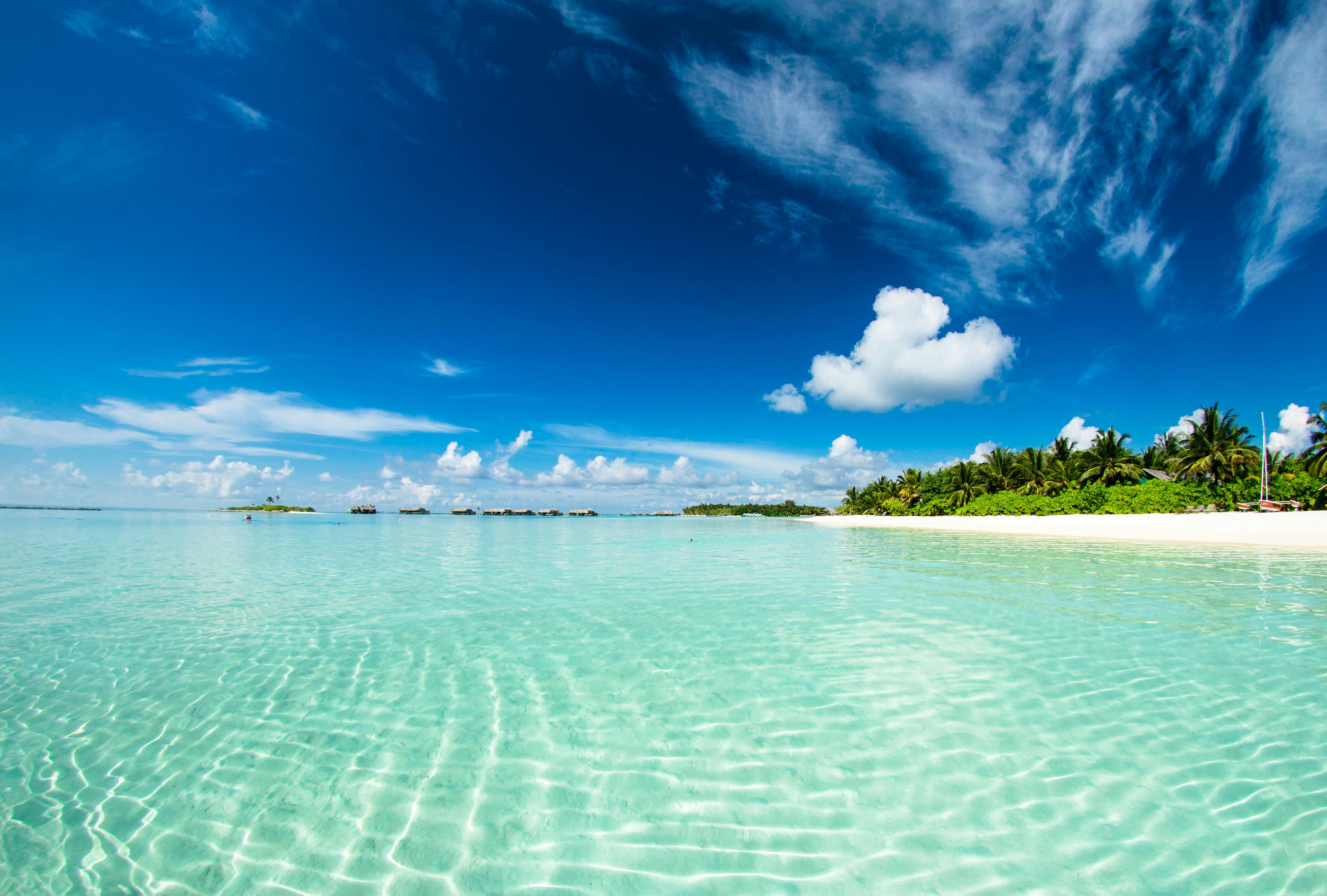 Aerial view of a turquoise Maldivian lagoon