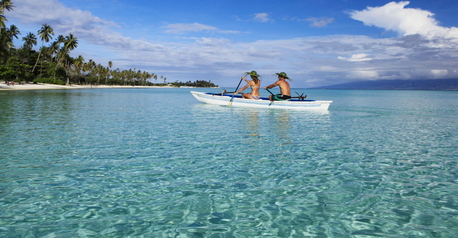Canoeing on the crystal-clear lagoon