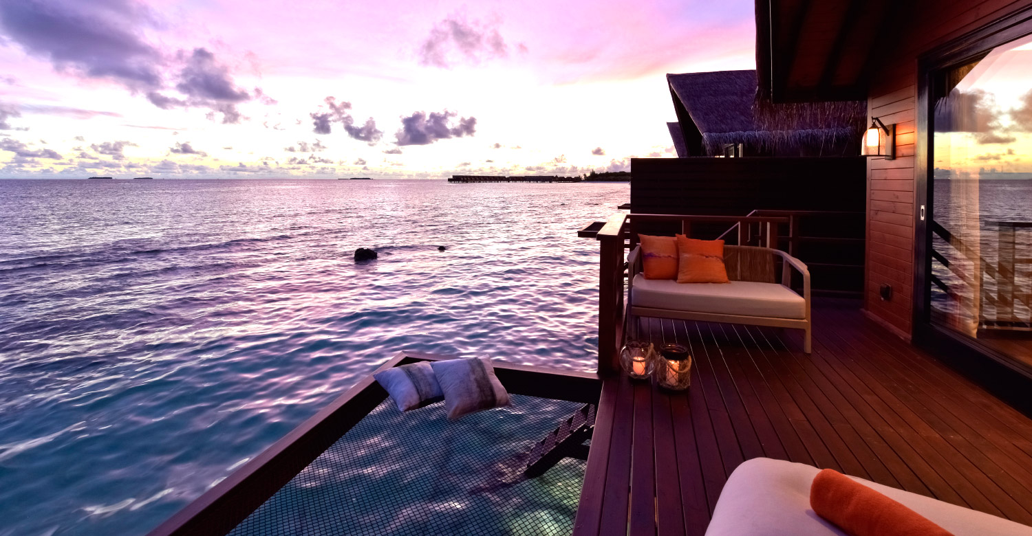 Grand Park Kodhipparu's ocean villa features a private terrace with sun lounger.
