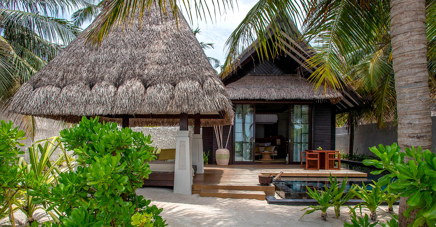 Jumeirah Vittaveli's beach villa sunrise accommodation