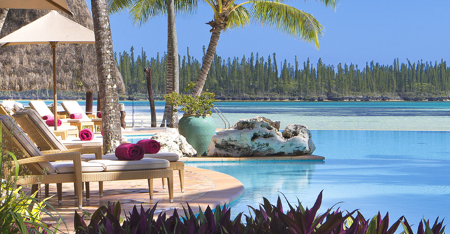 Lazing by the pool with views of the beautiful Oro Bay at Le Méridien Ile des Pins