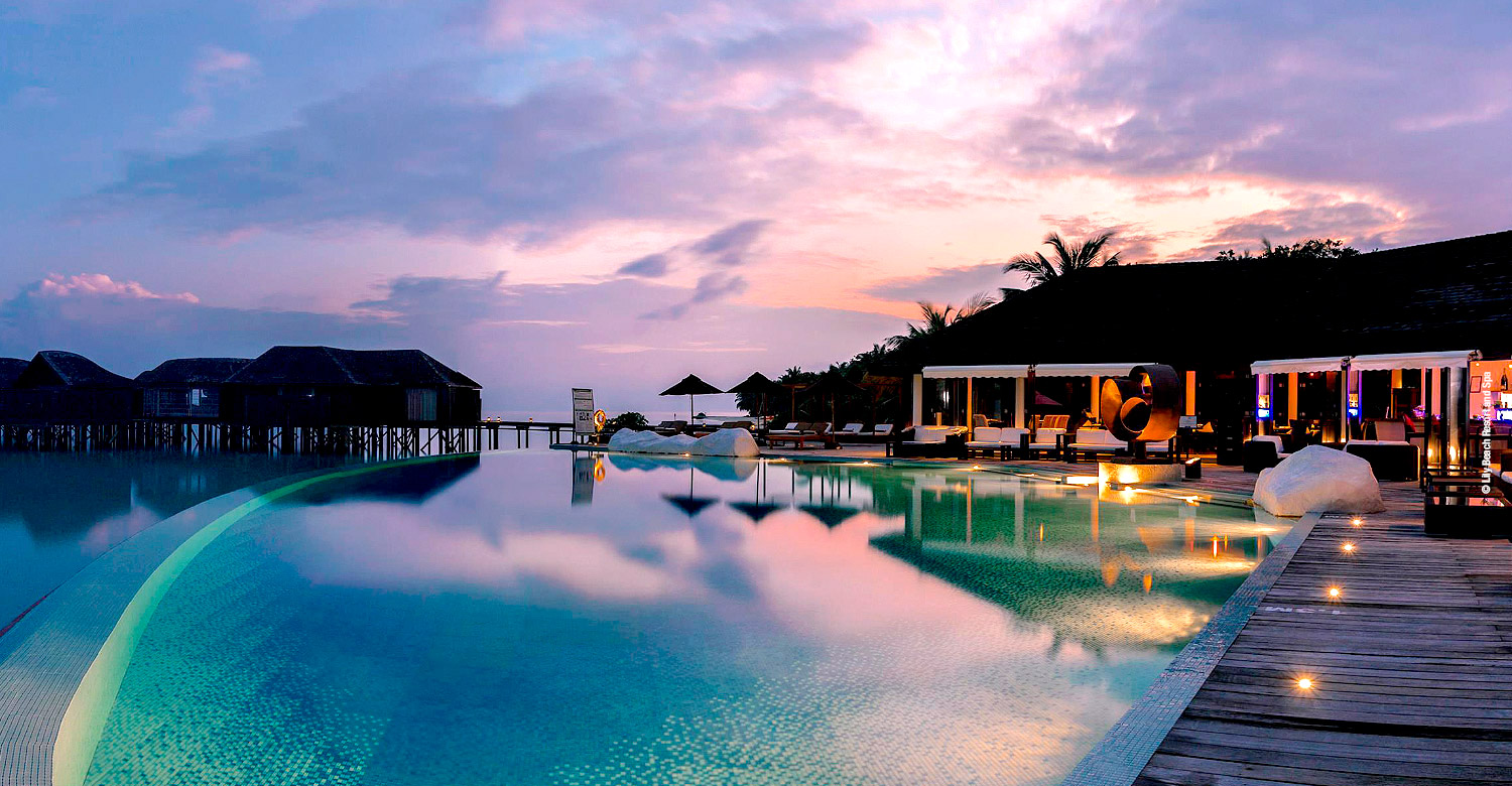 Sunset scene at Lily Beach Aqva Pool and Bar.