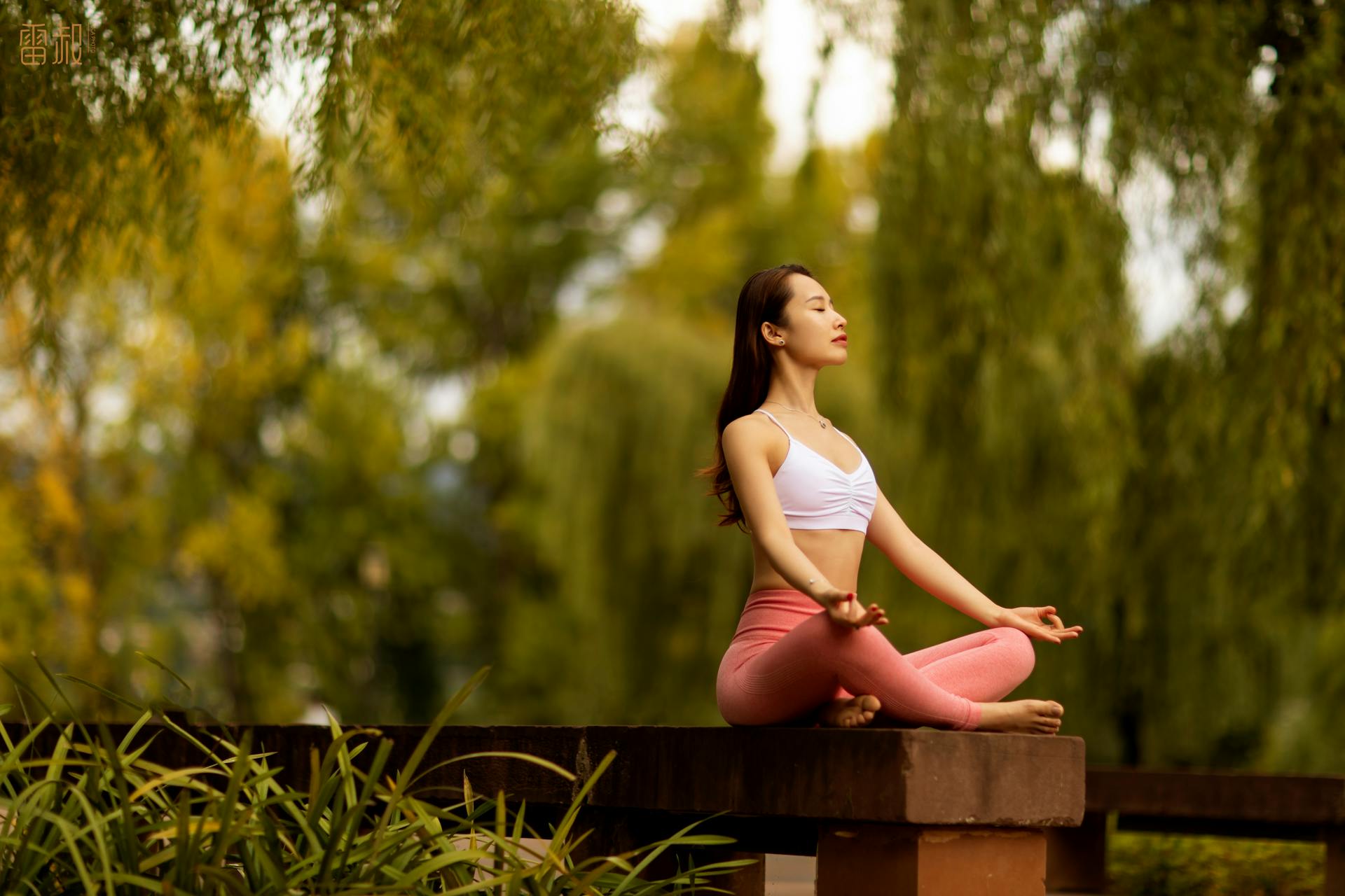 A woman doing yoga outdoors