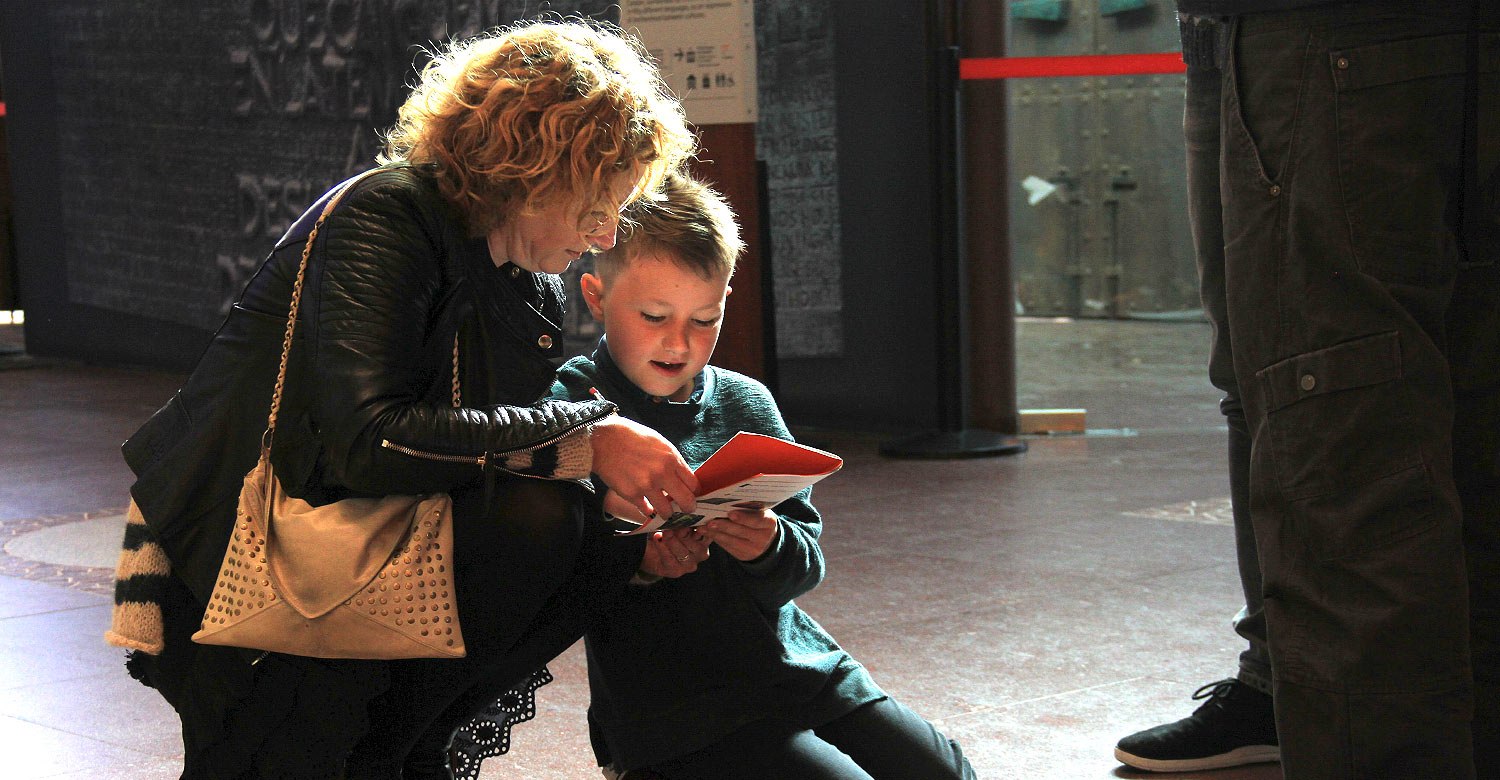 Kids have fun exploring Barcelona with their game booklet.