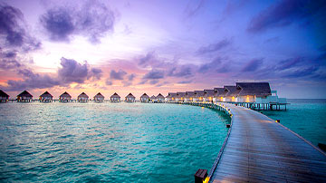 Overwater villas at Centara Grand Island Resort & Spa Maldives